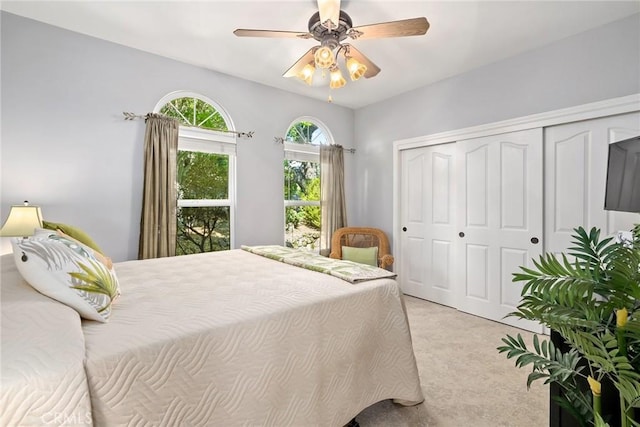 14600 El Monte Rd, Atascadero, CA 93422 - bedroom with light colored carpet, a closet, and a ceiling fan