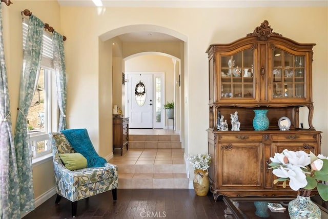 14600 El Monte Rd, Atascadero, CA 93422 - entrance foyer featuring arched walkways, baseboards, and hardwood / wood-style floors