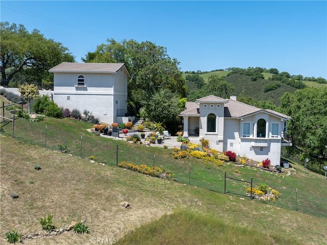 14600 El Monte Rd, Atascadero, CA 93422 - rear view of house with stucco siding, a patio area, and a chimney