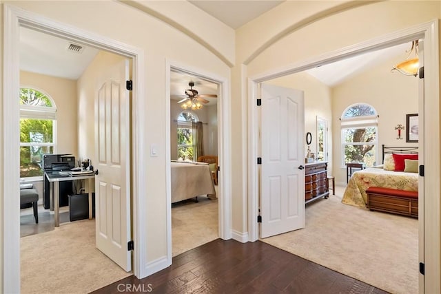 14600 El Monte Rd, Atascadero, CA 93422 - hall featuring dark wood-type flooring, dark carpet, vaulted ceiling, baseboards, and an office area