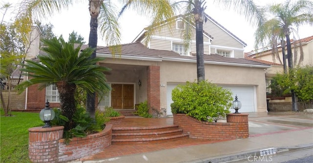 view of front of home with a garage