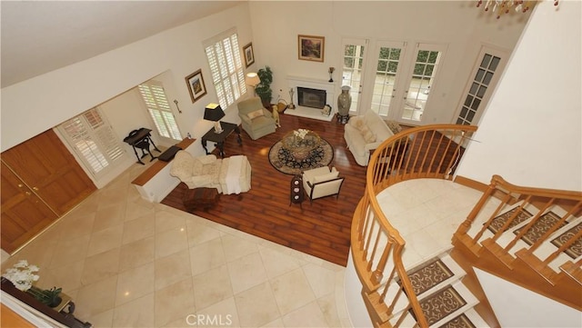 living room featuring light tile patterned floors and french doors