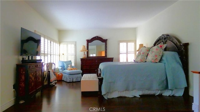 bedroom featuring dark hardwood / wood-style floors