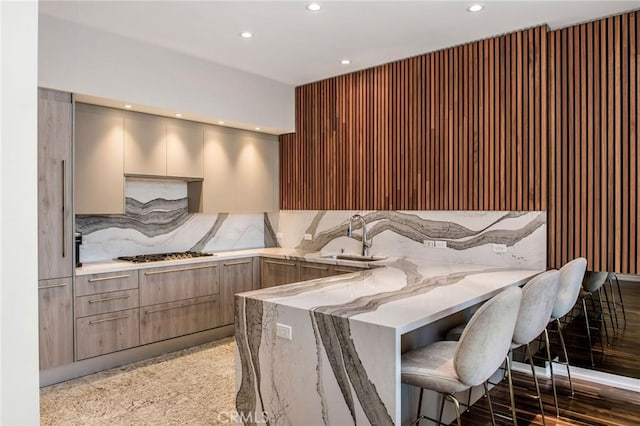 interior space with recessed lighting and a sink