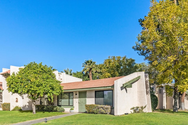 view of front of home with a front yard