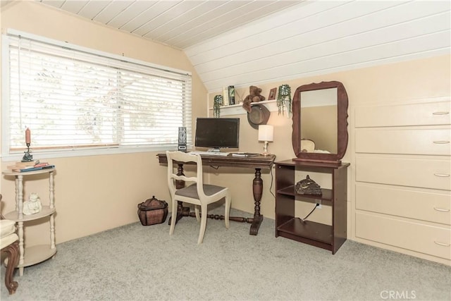 carpeted office space with lofted ceiling