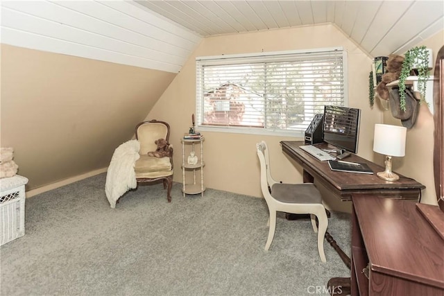 carpeted office space with lofted ceiling