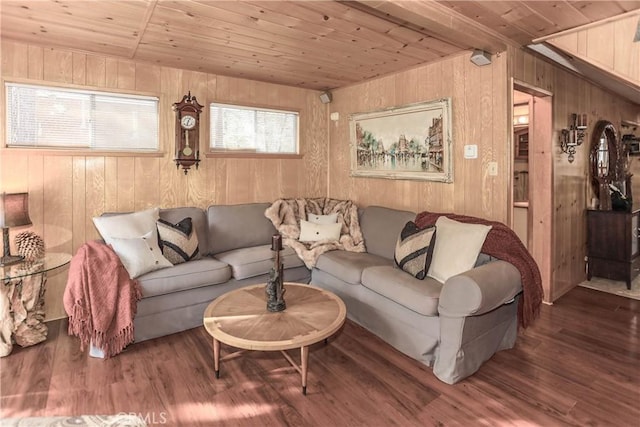 living room featuring wooden walls, dark wood-type flooring, and wood ceiling