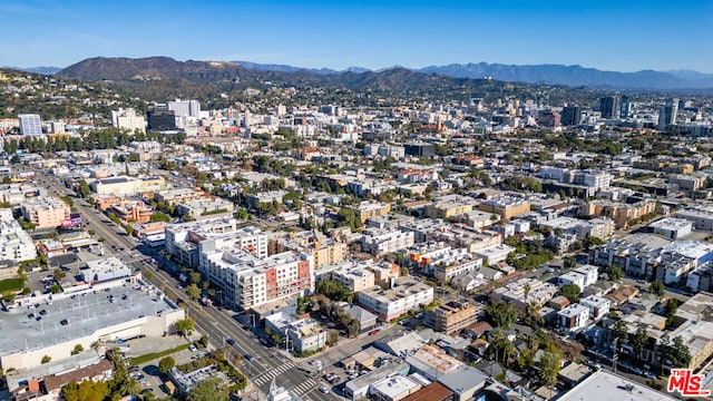 drone / aerial view featuring a mountain view