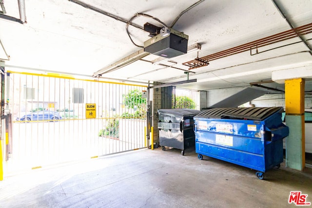 garage featuring a garage door opener