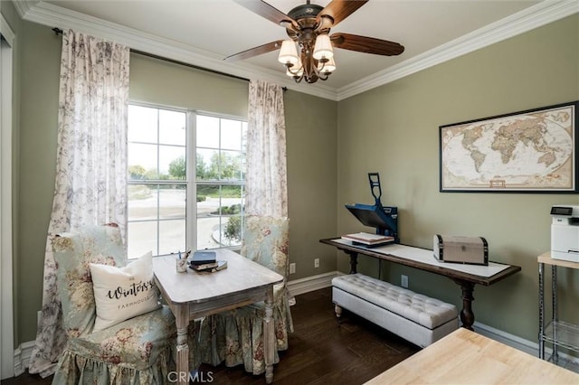 office space featuring a ceiling fan, baseboards, ornamental molding, and wood finished floors
