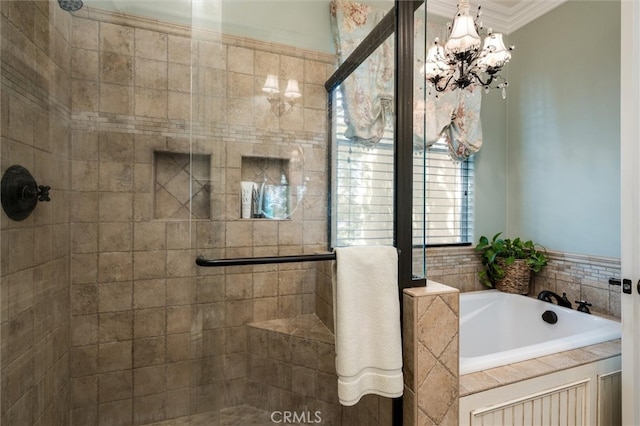 bathroom with a notable chandelier, crown molding, and independent shower and bath