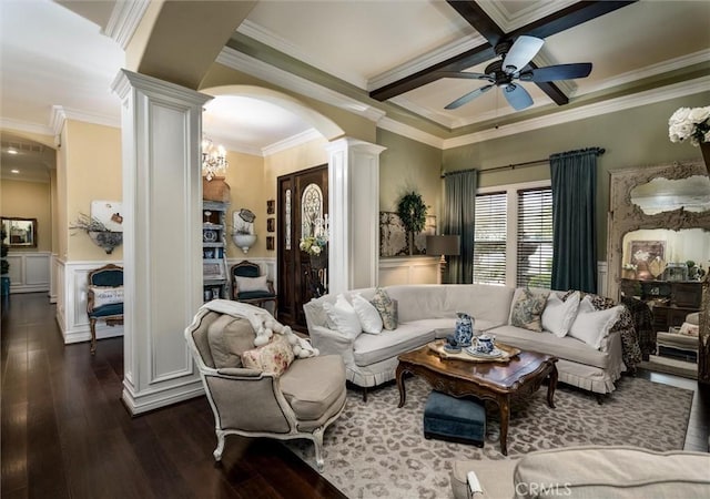 living area with coffered ceiling, a ceiling fan, ornamental molding, decorative columns, and dark wood-style flooring