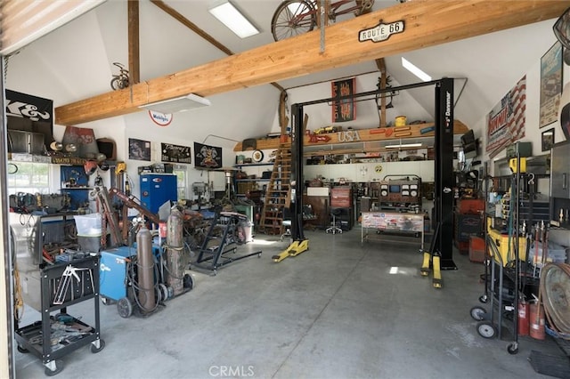 garage featuring a workshop area