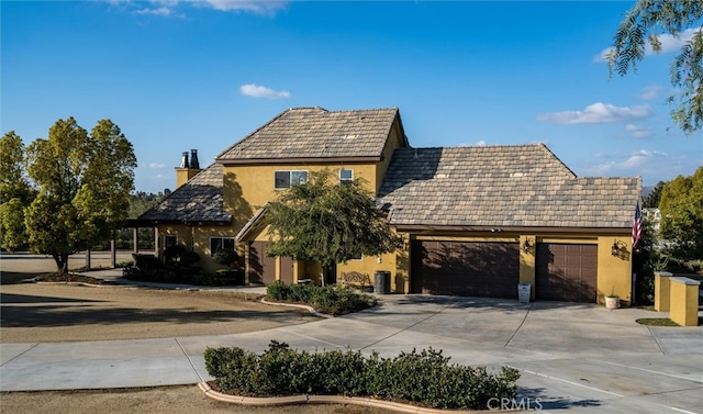 view of front of property with a garage