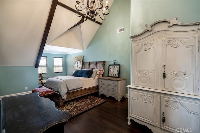 bedroom with high vaulted ceiling, a chandelier, dark wood finished floors, baseboards, and visible vents