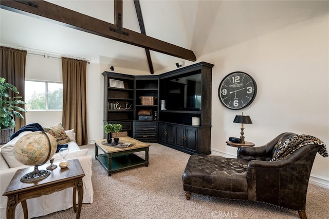 carpeted living room featuring beam ceiling and high vaulted ceiling