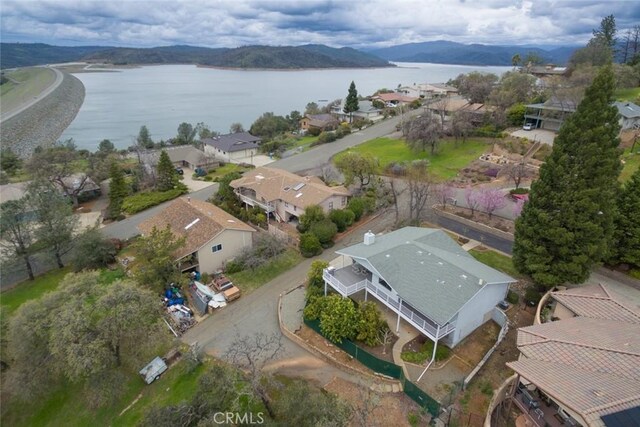 bird's eye view featuring a water and mountain view