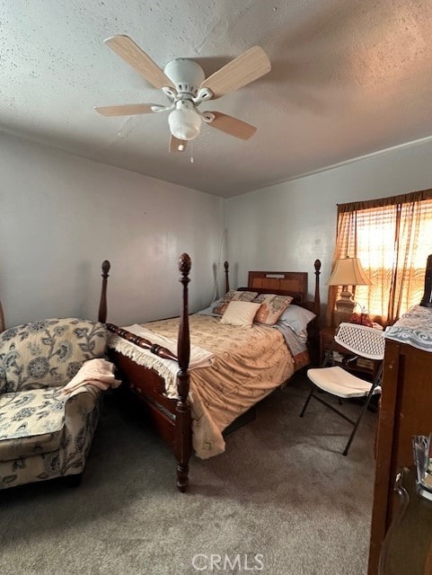 bedroom featuring carpet, a textured ceiling, and ceiling fan