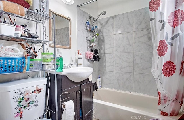 bathroom featuring vanity and shower / tub combo