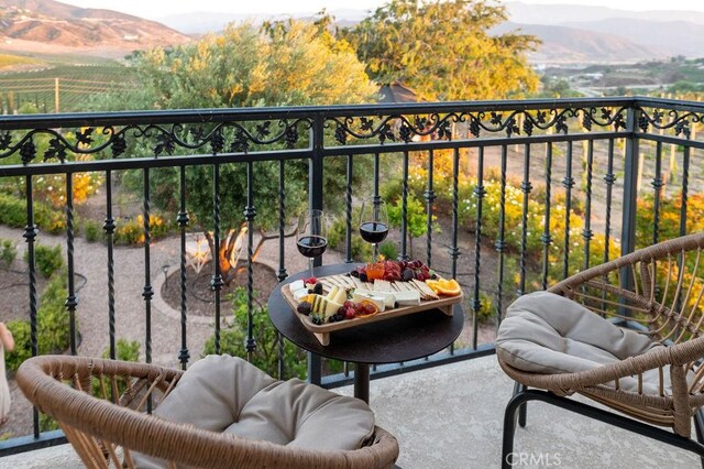 balcony featuring a mountain view