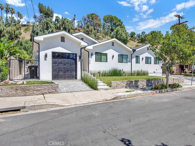 single story home with a garage