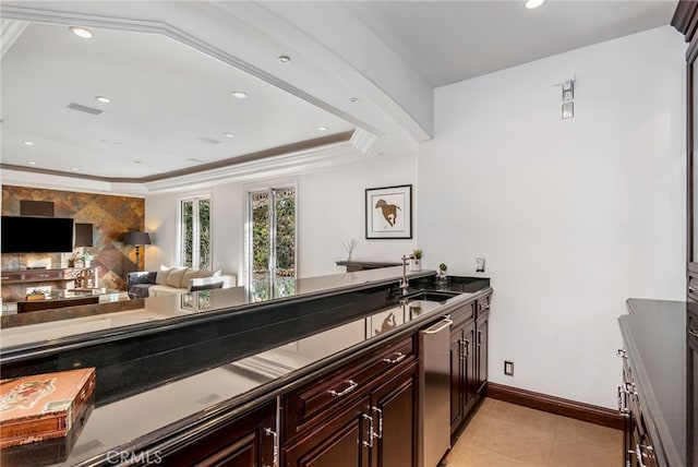 kitchen with stainless steel dishwasher, crown molding, light tile patterned floors, and sink