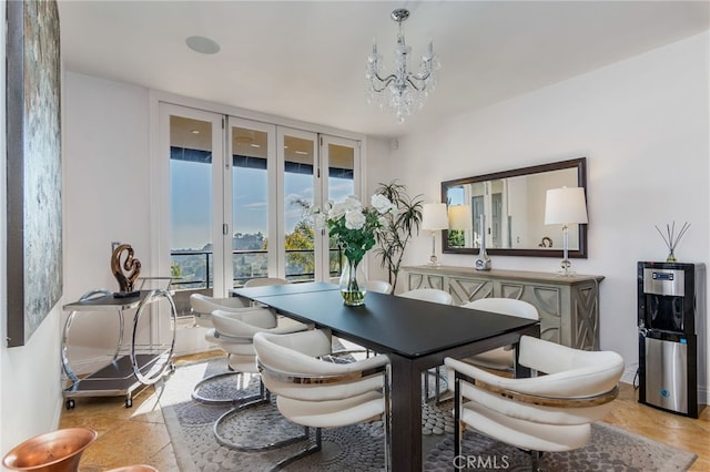 dining room featuring a chandelier