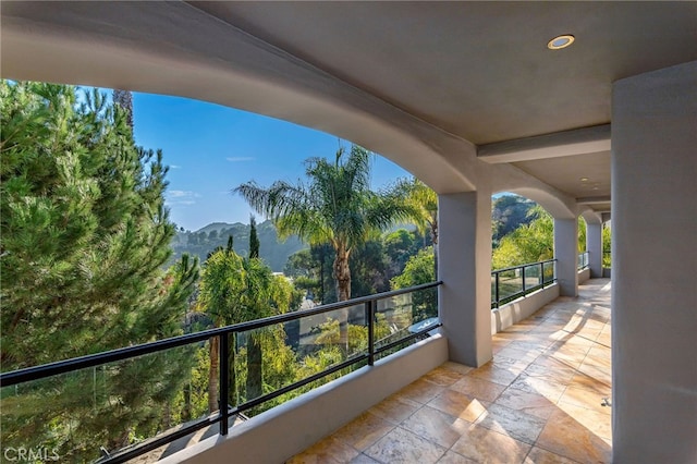 balcony featuring a mountain view