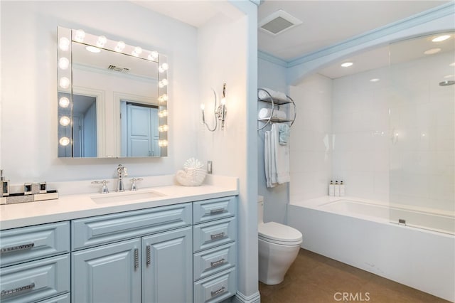 full bathroom with tiled shower / bath, vanity, tile patterned flooring, and toilet