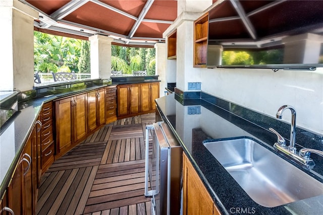 kitchen with plenty of natural light, sink, and extractor fan