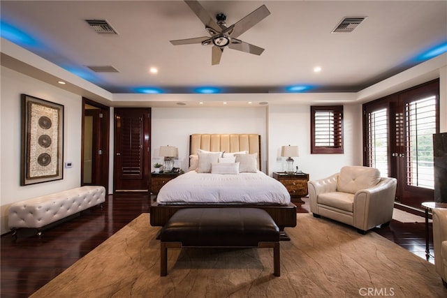 bedroom with access to outside, hardwood / wood-style floors, and ceiling fan