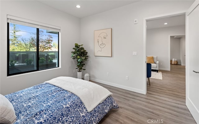 bedroom featuring hardwood / wood-style flooring