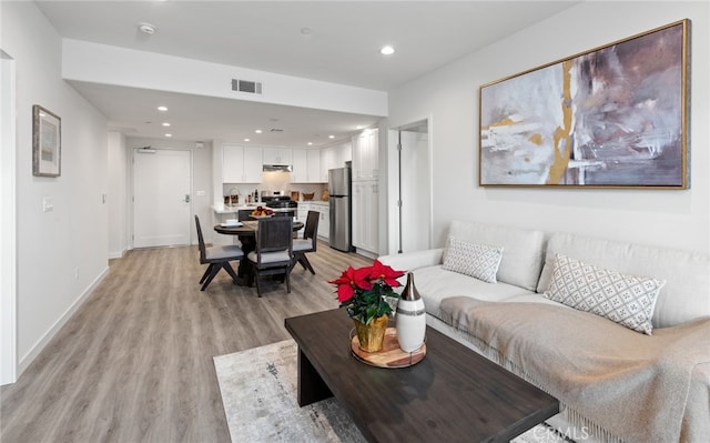 living room featuring light hardwood / wood-style flooring