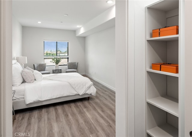 bedroom featuring light wood-type flooring