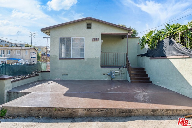 view of front of property with a patio