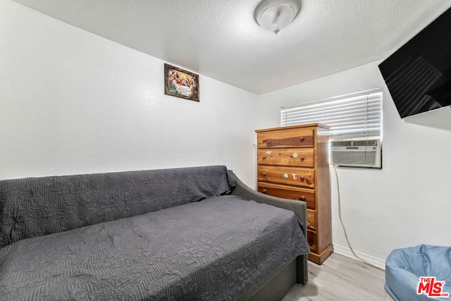 bedroom featuring light hardwood / wood-style flooring