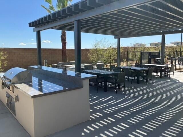 view of patio / terrace featuring exterior kitchen