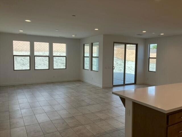 interior space featuring light tile patterned floors