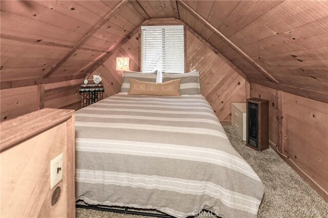 bedroom featuring carpet, wood ceiling, and wooden walls