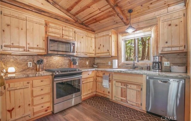 kitchen featuring pendant lighting, wood ceiling, appliances with stainless steel finishes, lofted ceiling with beams, and light brown cabinetry