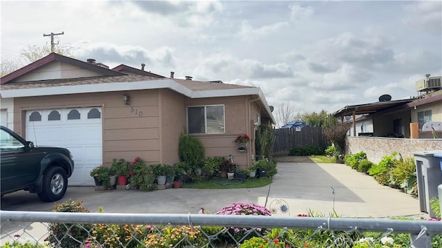 view of side of property featuring a garage