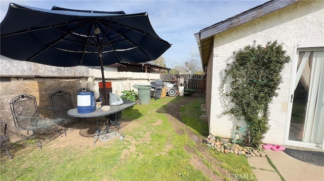 view of yard with a patio area