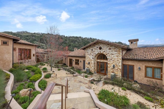 view of front of house featuring a patio area