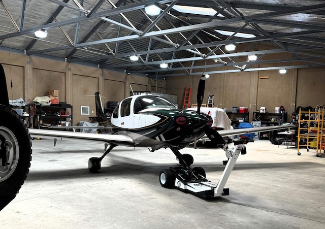 garage featuring wooden walls