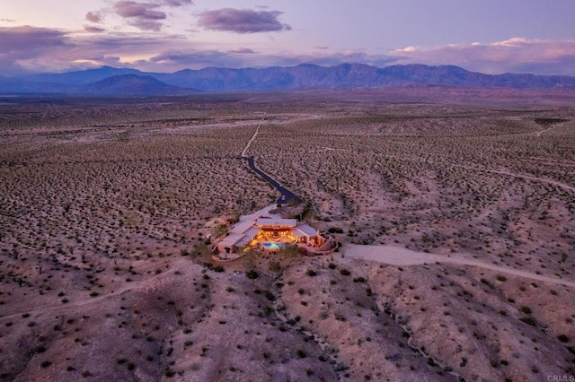 aerial view at dusk with a mountain view