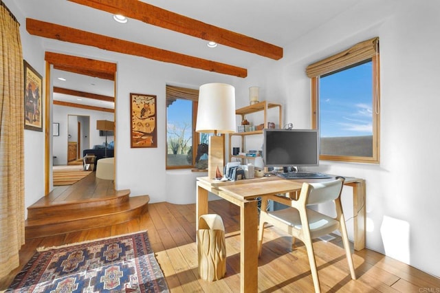 office area featuring beam ceiling and light hardwood / wood-style floors