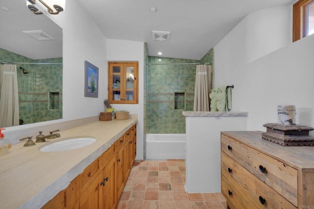 bathroom with vanity and shower / bath combo with shower curtain