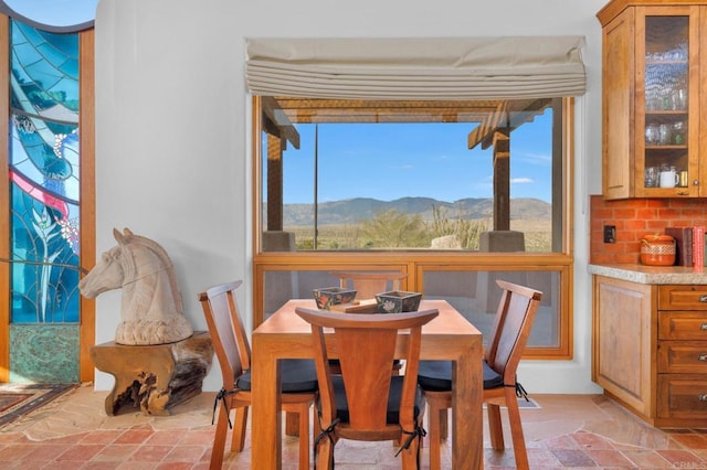 dining room with a mountain view