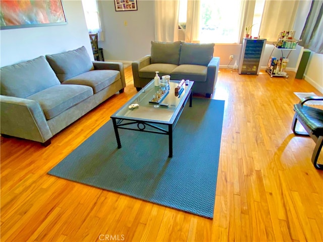 living room with light hardwood / wood-style floors